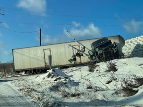 A tractor-trailer unit was struck by a train at the railway crossing on Railway Street in Kenora on Friday, Dec. 3.