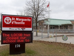 St. Marguerite d'Youville Catholic elementary school in northwest London is one of three elementary schools in the city closed because of multiple cases of COVID-19 that are part of cluster of 40 probable Omicron cases. St. Nicholas and St. Mary Choir and Orchestra elementary schools have also moved classes online until at least Dec. 13, the London District Catholic school board said. (Mike Hensen/The London Free Press)