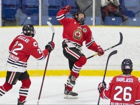 Sarnia Legionnaires' Dylan Dupuis celebrates with Brayden DeGelas and Cameron Barlass after scoring against the Strathroy Rockets at Sarnia Arena in Sarnia, Ont., on Thursday, Dec. 16, 2021. Shawna Lavoie Photography