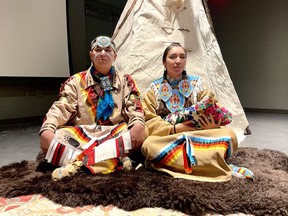 Gage Beaver and Harlena Smalleyes re-enact the nativity scene in a re-imagined Christmas tale with Indigenous dance, songs and storytelling, at the artsPlace on Dec.19. 2021. The Stoney Christmas play was performed by the Smalleyes Family, and told the story of the birth of Christ highlighting with the visitation of the three wise men, along with a fourth visitor to incorporate the four directions. Photo Marie Conboy/ Postmedia.