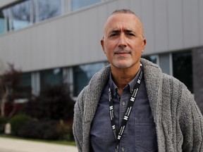 Roberto Almeida, a manager with Hastings Prince Edward Public Health, stands outside the Belleville headquarters in October.