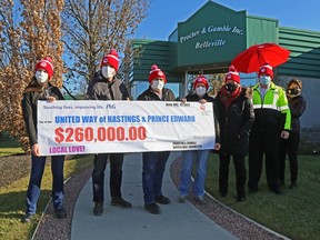 Belleville Procter and Gamble staff unveil this year's total of $260,000 raised for the United Way Hastings Prince Edward Monday in Belleville. From left: Kristen Sokolowski, Mutazz Akour, Danny Nickle, Tammy Empey, and the United Way's Brandi Hodge, Carl Bowker and Melanie Cressman.