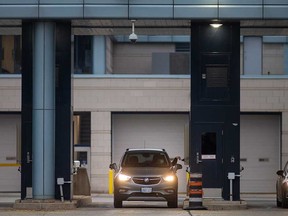 A vehicle re-enters Canada at the Windsor-Detroit tunnel on Nov. 30, 2021.