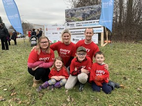 Amanda and Aaron Creery, with their children Phoenix (left), 11, Maddison, 4, Michael, 8, and Brayden, 3, were joined by other families, local leaders and representatives of Habitat for Humanity Heartland for a ground-breaking ceremony for a 56-unit housing project at 200 Brantwood Park Rd. Vincent Ball