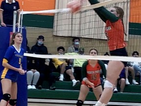 North Park Collegiate's Erin McKenna knocks down a point for the Trojans in an Athletic Association of Brant, Haldimand and Norfolk senior girls volleyball game against Brantford Collegiate Institute on Thursday at NPC.