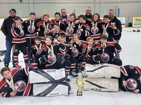 The Brantford Minor Hockey Association's under-13 MD 99ers, shown after capturing a recent tournament in London, was scheduled to take part in the Wayne Gretzky International Hockey Tournament until it was cancelled.