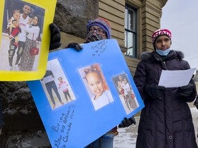 OTTAWA -- Somali refugee Nasro Adan Mohamed (R), who now lives in Brockville, Ont., and some supporters went to the Prime Minister's Office in downtown Ottawa on Tuesday to deliver a petition and to plead with Prime Minister Justin Trudeau to issue a special permit reuniting Nasro with her 3-year-old daughter, Afnaan, and husband, Liiban, who remain stuck in refuge in Uganda. Nasro Mohamed, 27, has been living alone in Canada since late October 2019,. Tuesday, Dec. 7, 2021 -- . ERROL MCGIHON, Postmedia