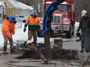 A repair crew deals with a water-line break near the end of Churchill Road East in Prescott on Tuesday morning. Workers repaired a break less than two blocks away on Churchill at Woodland Drive on Monday morning. Tim Ruhnke/The Recorder and Times