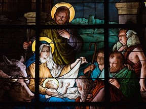 Stained glass window depicting a Nativity Scene.