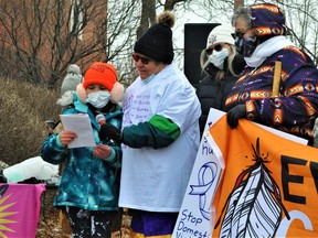 A handful of Ashley Thompson's family members addressed the crowd prior to walking down Pitt Street on Saturday. Among them was her daughter and mother, pictured. Photo taken on Saturday December 4, 2021 in Cornwall, Ont. Francis Racine/Cornwall Standard-Freeholder/Postmedia Network