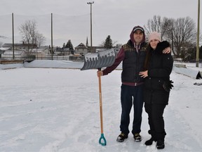 Corey Baze Stone and Cheyenne Leger will be volunteering their time to maintain the rink at King George Park in Cornwall again during the 2021-2022 season. They were seen clearing off the rink tarp on Tuesday December 28, 2021 in Cornwall, Ont. Shawna O'Neill/Cornwall Standard-Freeholder/Postmedia Network