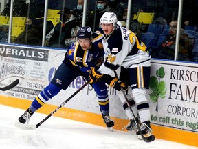 Fort McMurray Oil Barons defenseman Lucas Jones battles the Spruce Grove Saints at Centerfire Place on Friday, December 3, 2021/ Laura Beamish/Fort McMurray Today/Postmedia Network