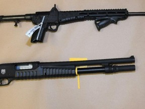 A police photo of firearms seized in several local raids.