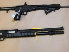 A police photo of firearms seized in several local raids.