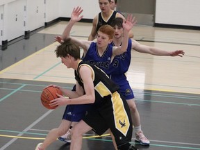 The Hanna Sr. Boys basketball team had a close game against Three Hills in Hanna, Ab on Dec. 13. While the teams traded points throughout the game, the visiting team ultimately emerged victorious with a final score of 62-59. Jackie Irwin/Postmedia