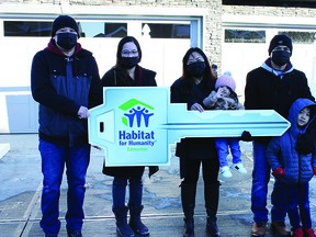 Two families took possession of Habitat for Humanity homes last week in Leduc's Meadowview neighbourhood. (Ted Murphy)