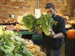 Inflation is currently gripping the Canadian and world marketplaces with demand seemingly overriding supply chain in many sectors. (Pictured) Mario Aricci of Ponesse Foods at St. Lawrence Market said prices for his fruits and vegetables have skyrocketed recently and he has noticed a decline in clientele in the overall Market on Thursday October 21, 2021.