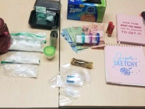 Street drugs including fentanyl and crystal methamphetamine, scales and cash seized during the search of a home on Division Street in Kingston by the police.