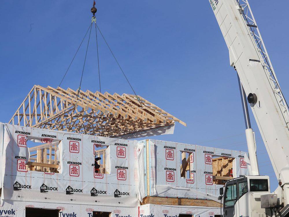 Habitat for Humanity raises roof on local townhome project Brockville