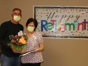 Brett Gibson, left, Carveth Care Centre Administrator with Carole Wedge, a nurses' aide who celebrated her retirement in Oct, 2021. Supplied photo