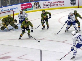 Luca DelBelBelluz of the Mississauga Steelheads gauges a shot against goaltender Dom DiVincentiis of the visiting North Bay Battalion in Ontario Hockey League play Wednesday night. The Troops host the Ottawa 67's at 4 p.m. Friday in the traditional New Year's Eve game.