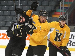 Kingston Frontenacs forward Zayde Wisdom, centre, works out at practice at the Leon's Centre on Tuesday.