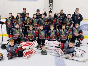 The South Huron Sabres U11 Rep team came home as champions from the Bill Carnochan Memorial Tournament held in Seaforth in November. In front from left are Steven Douwes and Roscoe Rau; second row Aven Tilley, Brody Phillips, Myles Theophilopoulos, Jax Kerslake, Taylor Kuenzig and Thorsten Petersen; third row Nick McCann, Eric Leyten, Kaiden McClellan, Kael Dalrymple, Riley Hayter, Grant Hoffman, Pierson Carter and Jack Reid; and back row assistant coach Ted Hoffman, coach BJ Theophilopoulos, assistant coach Greg Dalrymple and trainer Ken Tilley.