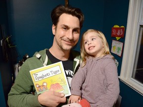 Former Zurich resident Gerard Creces, seen with his daughter Heather, just released his first book, The Spaghetti Tiger.