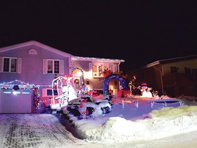 Photo by KEVIN McSHEFFREY/THE STANDARD
This home is located on Kain Crescent, it is one of many homes in Elliot Lake that are beautifully decorated for the Christmas Holidays. And it looks like this year more than ever. It is worth one’s time to drive around the city in the evening to view the splendor of these wonderfully festival homes. The Standard wishes everyone to have a very Merry and Safe Christmas.
