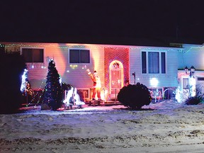 Photo by KEVIN McSHEFFREY/THE STANDARD
Many homes are highly decorated for the Christmas Holidays in the region. This house is on Washington Crescent in Elliot Lake. Many residents continue to turn on their Christmas lights until New Year’s and a bit beyond. An evening’s drive can still see their stunning lights. Happy New Year from The Standard.