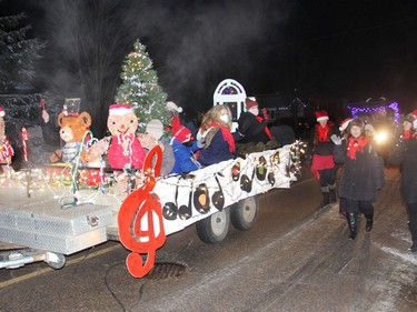 The Canadian Military Wives Choir Petawawa sings some seasonal favourites during the town's Santa Claus parade on Dec. 4. Anthony Dixon