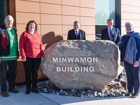 Canada's national nuclear laboratory welcomes Algonquins of Ontario representatives to Chalk River Laboratories to celebrate the opening of the 'Minwamon Building,' the site entrance building at the Chalk River Campus. In the photo from left, Elder Dan Ross, Connie Mielke, Algonquin Negotiation Representative Algonquins of Greater Golden Lake, AECL President and CEO Fred Dermarkar, CNL President and CEO Joe McBrearty, and Lynn Clouthier, Algonquin Negotiation Representative Ottawa Algonquin Community.
