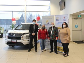 Irene Coulombe of Ottawa was the grand prize winner of a 2022 Mitsubishi Outlander ES SUV in the Pembroke Regional Hospital Foundation's second annual Auto Lotto for Healthcare. Coulombe recently picked up (and drove away in) her prize from one of the event's sponsors Pembroke Mitsubishi. In the photo from left, Pembroke Mitsubishi sales manager Therran MacLellan, winner Irene Coulombe, Foundation executive director Roger Martin and Foundation community fundraising specialist Leigh Costello. Anthony Dixon