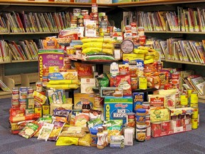 Want to avoid paying overdue library book fines? Pay up with a donation to a local food back. Again this holiday season, the Bruce County Public Library System is staging its annual Food for Fines program at all 17 branches in Bruce County. [File photo]