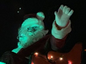 Atop a bedecked sleigh, Santa Claus 'HO HO HO'ed' his way through Port Elgin Nov. 27 to the delight of crowds lining Goderich St. from Market St. to the Giant Tiger plaza.