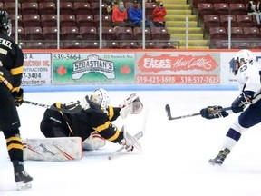 Woodstock's Patrick Klazer scores against Tavistock Friday at Southwood Arena. Tavistock won 5-4.