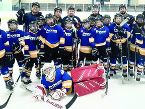 Calem Mangone of the Saginaw Spirit of the Ontario Hockey League, in back row, third from right, with members of the under-11 Prouse Motors Rangers of the Soo Pee Wee Hockey League. MICHELLE BARSANTI