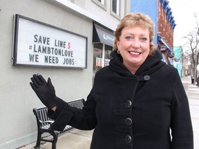Sarnia-Lambton MP Marilyn Gladu stands near a sign in downtown Sarnia supporting the Line 5 pipeline that helps supply local refineries and chemical plants. Michigan's governor is trying to shut down the pipeline's crossing at the Straits of Mackinac.