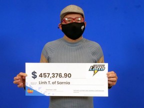 Linh Truong, a 63-year-old Sarnia man, won nearly half a million dollars through a "random" decision to buy an extra lottery ticket. (OLG)