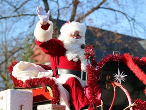Santa Claus waves to the crowd during the town's parade on Saturday December 4, 2021 in Petrolia, Ont. Terry Bridge/Sarnia Observer/Postmedia Network