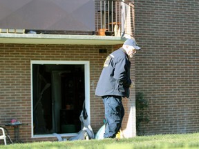 Clive Hubbard, a fire investigator with the Ontario Fire Marshal's office, inspects the aftermath of an explosion inside a Finch Drive apartment building on Monday, Dec. 13, 2021 in Sarnia, Ont. (Terry Bridge/Sarnia Observer)