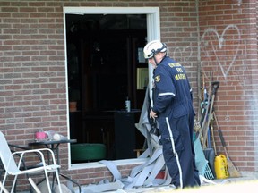 Clive Hubbard, an investigator with the Ontario Fire Marshal's Office, inspects the aftermath of an explosion inside a Finch Drive apartment on Tuesday, Dec. 14, 2021 in Sarnia, Ont. (Terry Bridge/Sarnia Observer)