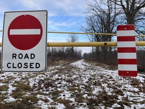 A section of Crooked Road, seen here on Thursday, Dec. 30, 2021, in Enniskillen Township, Ont., Is permanently closed due to an impassable area, a resident says.  Police said a complaint about a suspicious person in the area led to a two-death investigation.  (Terry Bridge / Sarnia Observer)