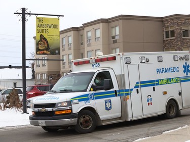 An ambulance leaves the Amberwood Suites retirement home, where a COVID outbreak led to the deaths of numerous residents, in January. John Lappa/Sudbury Star