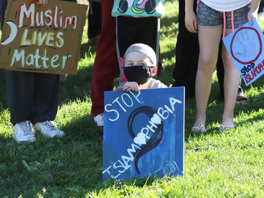 Muhammad Ali, 9, participates in a vigil, organized by the Islamic Association of Sudbury at Memorial Park in downtown Sudbury, Ont. on Friday June 11, 2021, in memory of four members of a Muslim family who were killed in what police say was a targeted attack in London, Ont. this past Sunday. John Lappa/Sudbury Star/Postmedia Network