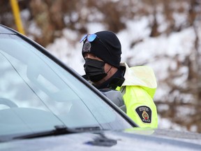 Greater Sudbury Police conduct a spot check on Frood Road in Sudbury, Ont. on Thursday December 2, 2021. On Friday, the courts in Sudbury dealt with a number of drinking and driving cases. John Lappa/Sudbury Star/Postmedia Network
