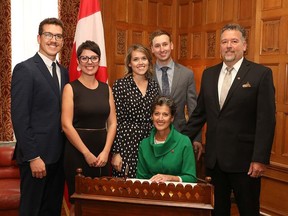 Senator Josée Forest-Niesing, seated, was joined by her family when she was sworn in to the Senate in October 2018. From left, son Philippe Niesing and daughter-in-law Catherine Sampson, daughter Véronique Niesing and son-in-law Andrew Moss, and husband Robert Niesing. Supplied