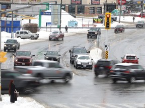 Traffic flows through the intersection of Regent Street and Long Lake Road on Dec. 6.