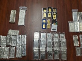 Police in Elliot Lake recovered more than $104,000 in gold and silver bars, plus drugs as part of a drug trafficking and money laundering investigation. OPP photo