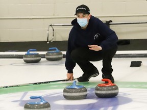Vice Jesse Crozier, of Sacre-Coeur, calls a shot during high school curling action against Lo-Ellen Knights at Curl Sudbury in Sudbury, Ont. on Tuesday December 14, 2021. John Lappa/Sudbury Star/Postmedia Network